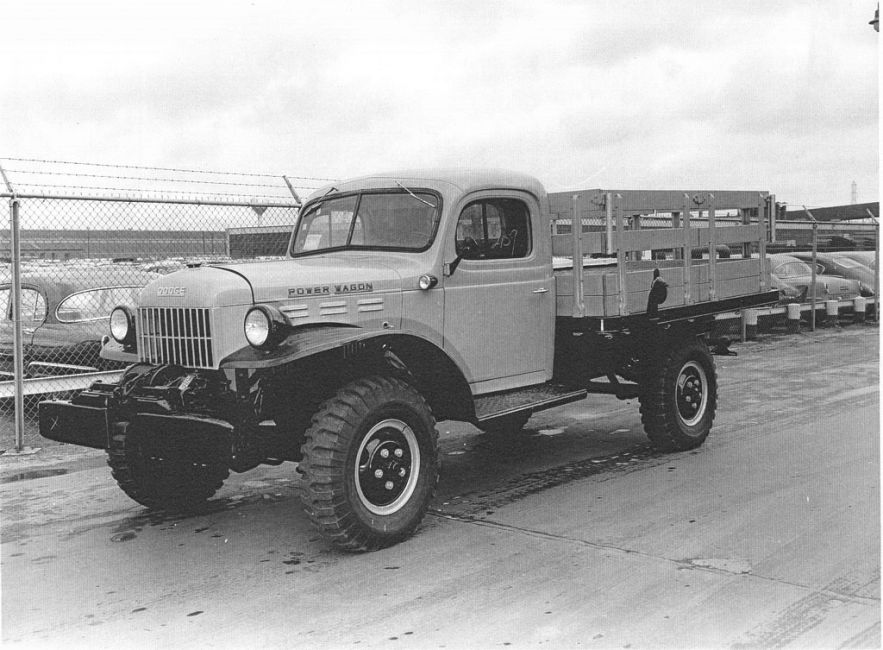 Fresh Off The Assembly Line
I would like to find some literature that shows who the vendor was that supplied Dodge with this flat bed and stake racks. It appears that the photo was taken outside the factory. The truck may have been outfitted by the Special Equipment Group at Dodge.
