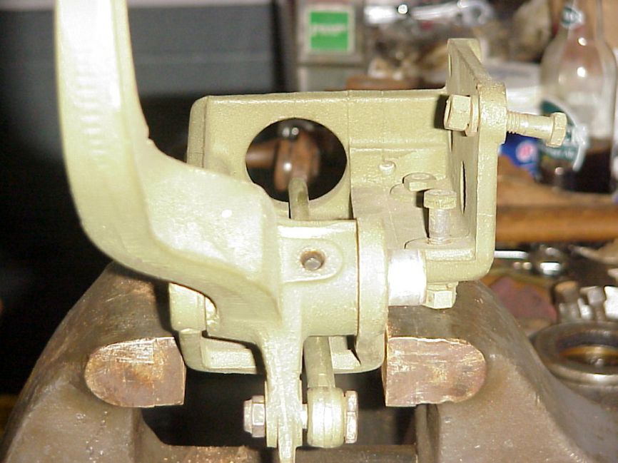 Front view showing bottom of pedal and push rod in bracket.
