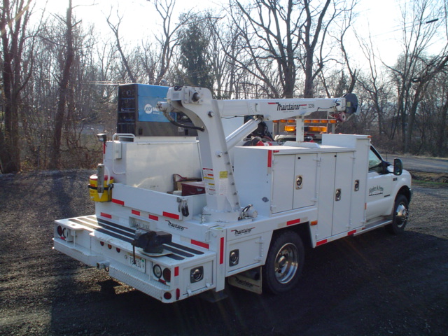 2001 Ford F 550
Rear view with 8000 lb  Hyd. Crane. Comes in real handy!
